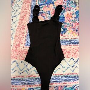 Vestique Black Ruffle Strap Bodysuit